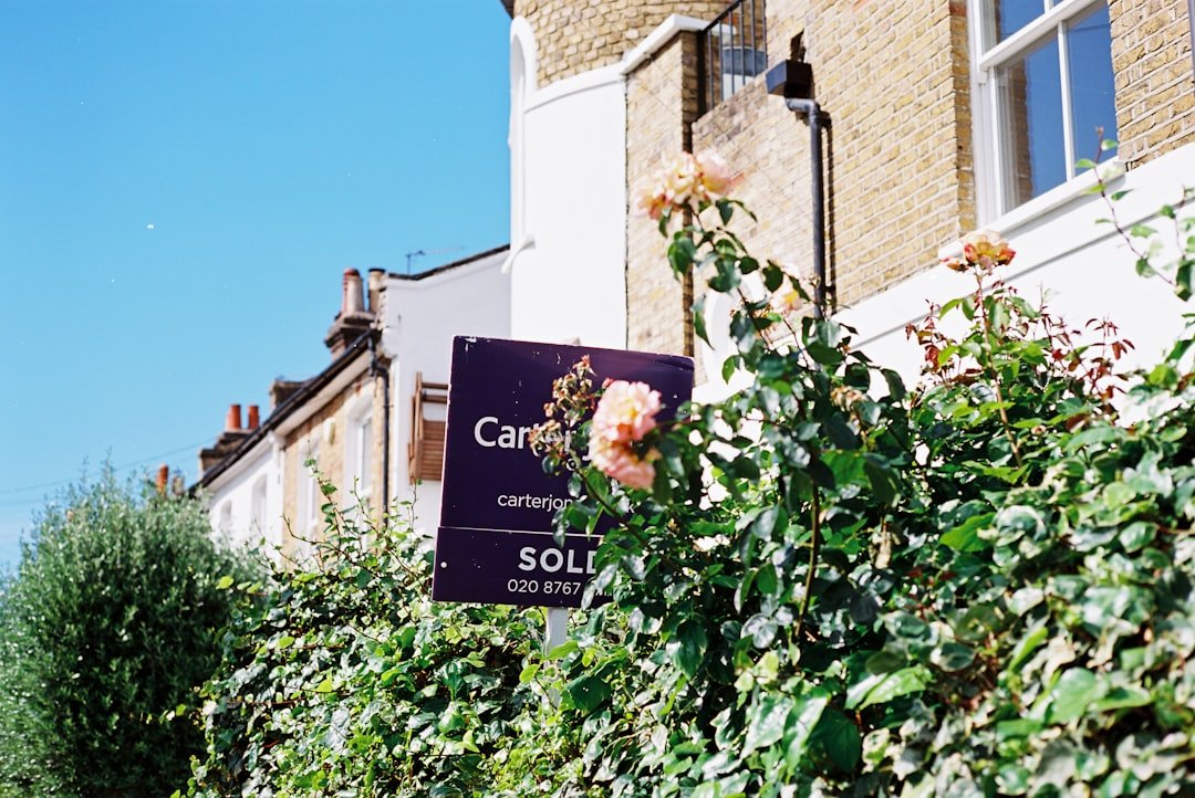 Sold sign in front of a house